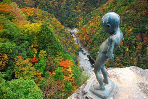 Peeing boy at Iya Valley